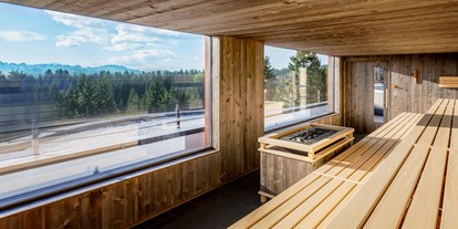 Luxusurlaub - Saunalandschaft: finnische Sauna - Panoramasauna im Wellness & Naturresort Reischlhof - Wellness & Naturresort Reischlhof **** Superior 