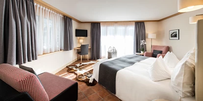 Luxusurlaub - Hotel-Schwerpunkt: Luxus & Familie - Doppelzimmer Chalet Golfino - GOLFHOTEL Les Hauts de Gstaad & SPA
