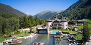 Luxusurlaub - Pools: Schwimmteich - Fontis Luxury Spa Lodge