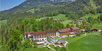 Luxusurlaub - Saunalandschaft: finnische Sauna - Alpenhof im Sommer - Alm- & Wellnesshotel Alpenhof****s