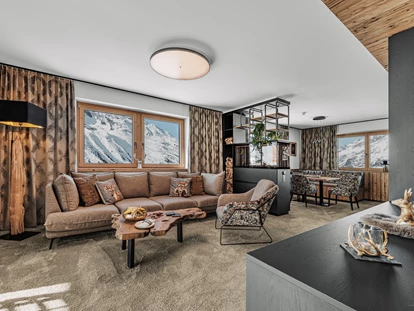 Luxusurlaub - Völlan - Chalet Wohnzimmer - SKI | GOLF | WELLNESS Hotel Riml****S