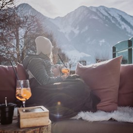 Luxushotel: Die Aussicht auf die Bergwelt genießen - egal ob Sommer oder Winter - Verwöhnhotel Berghof