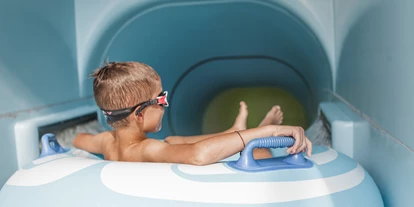 Luxusurlaub - Hotel-Schwerpunkt: Luxus & Familie - Reifenrutsche im Splash - Wasserbereich für Kinder - Schlosshotel Fiss