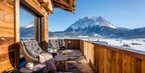 Luxusurlaub - Einrichtungsstil: alpenstil - Aussicht auf die Zugspitze - Hotel Post Lermoos