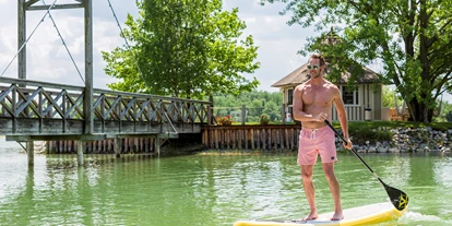 Luxusurlaub - Andau - StandUp Paddling im Sommer am hauseigenen Badesee  - VILA VITA Pannonia