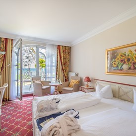Luxushotel: Doppelzimmer mit Seeblick und Terrasse - Rugard Thermal Strandhotel