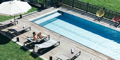 Luxusurlaub - Hotel-Schwerpunkt: Luxus & Familie - Ganzjährig beheizter Außenpool - Boutique Hotel DAS RIVUS