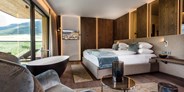 Luxusurlaub - Saunalandschaft: Dampfbad - Romantic Suite - Hotel Paradies Family & Spa