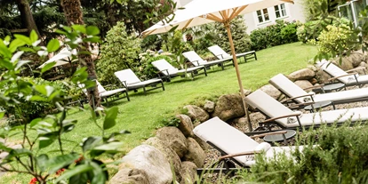Luxusurlaub - Sen Jan di Fassa - Gartenanlage - Classic Hotel Meranerhof