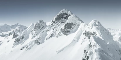 Luxusurlaub - Hotel-Schwerpunkt: Luxus & Familie - Obertauern mit seiner mächtigen Bergkulisse - Hotel Rigele Royal****Superior