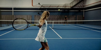 Luxusurlaub - Hotel-Schwerpunkt: Luxus & Familie - Tennishalle im Alpina  - Alpina Alpendorf
