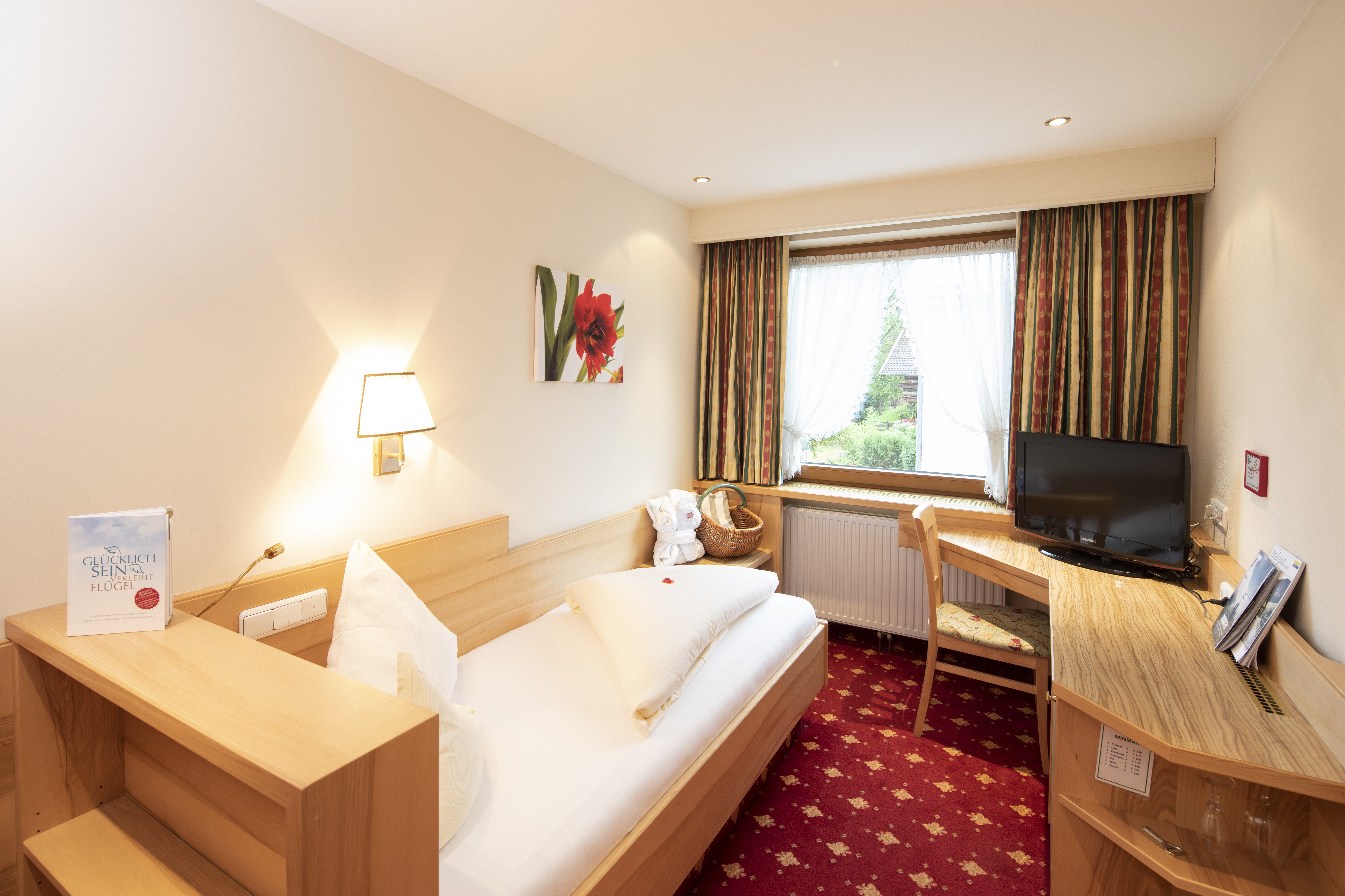 Hotel „Der Kirchenwirt****s" Zimmerkategorien Einzelzimmer Koglblick