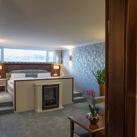 Luxushotel: Hotel Albona Nova Zürs am Arlberg 
Junior-Suite gemütlich-kuschelig  - Hotel Albona Nova