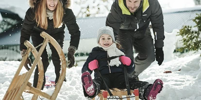 Luxusurlaub - Bar: Poolbar - Waldhaus Flims - Rodeln im Waldhaus Park - Waldhaus Flims Wellness Resort