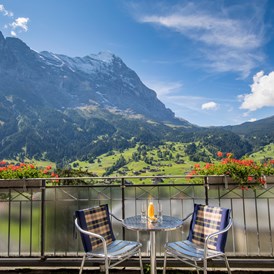 Luxushotel: Balkon mit Blick auf den Eiger, Hotel Belvedere Grindelwald - Belvedere Swiss Quality Hotel Grindelwald