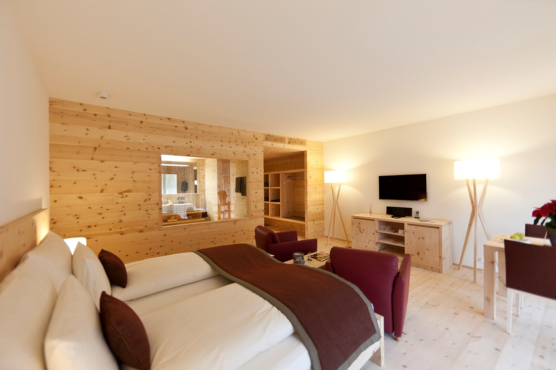 Luxushotel: Terrassen Junior-Suite - In Lain Hotel Cadonau