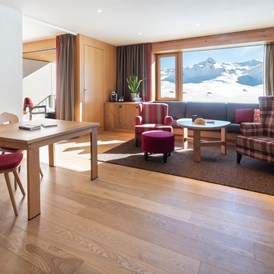 Luxushotel: Suite Wohnbereich, Winter - Frutt Mountain Resort