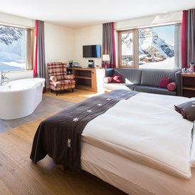 Luxushotel: Junior Suite mit Badewanne, Winter - Frutt Mountain Resort