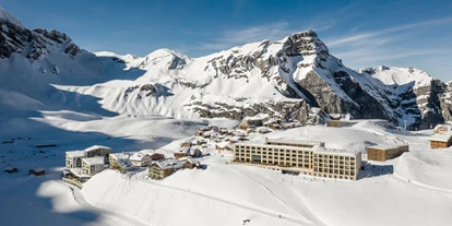 Luxusurlaub - Parkplatz: gebührenpflichtig in Gehweite - Melchsee-Frutt, Winter - Frutt Mountain Resort