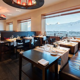Luxushotel: Restaurant Titschli, Winter - Frutt Mountain Resort