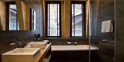 Luxusurlaub - Hotel-Schwerpunkt: Luxus & Sport - Matterhorn Suite Bad - Unique Hotel Post Zermatt