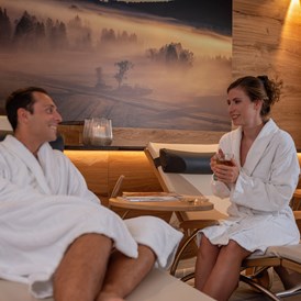 Luxushotel: Entspannen nach einem Saunagang in unserem Ruheraum mit Kaminfeuer. - Concordia Wellnesshotel & Spa 